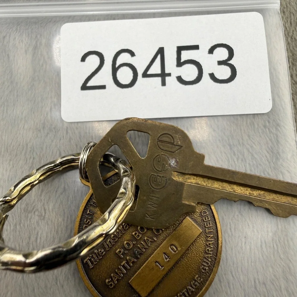 Vintage First American‎ Title Insurance Company Keychain Brass
